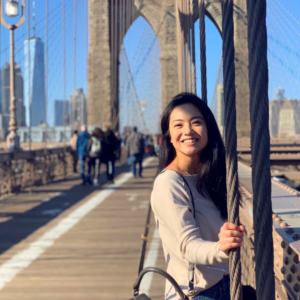 Headshot photo on the Brooklyn bridge
